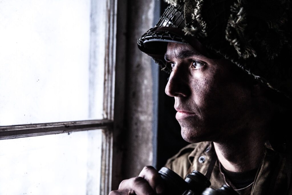 Lieutenant Colonel Robert Cole watches his troops defend their Command Post during a German counter attack. (Dramatic recreation) Zachery Fiorido