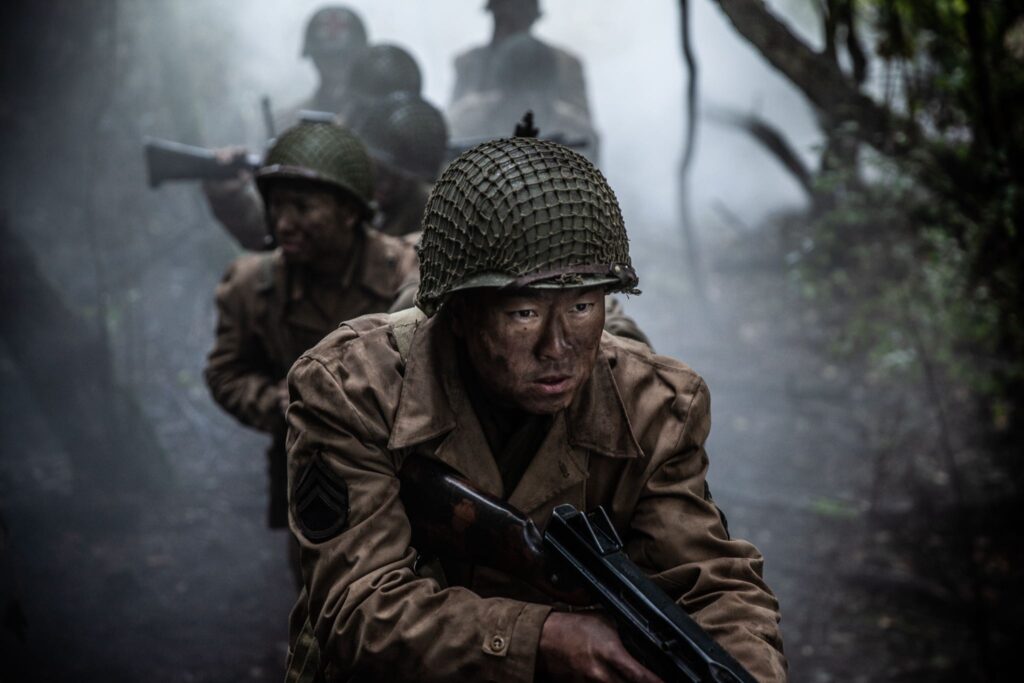 Sergeant Shiro Kashino leads his men through the Vosges Mountains, France. (Dramatic Recreation) Alex Law