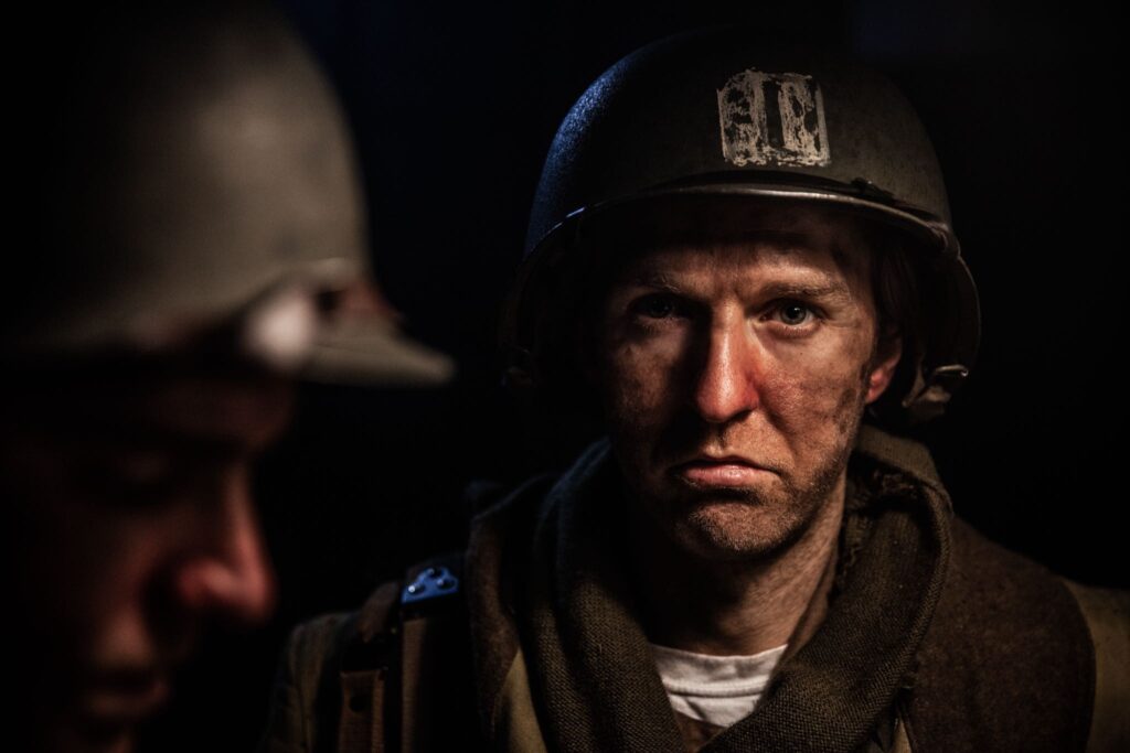 Captain William Corson, 'A' Company Commander, oversees defenses from his Command Post in Hatten, Germany. (Dramatic Recreation). Reece Presley.