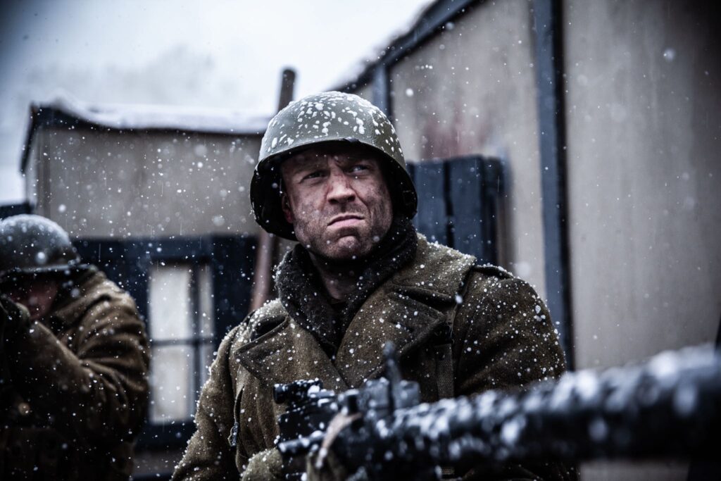 A 242nd Infantry Regiment Soldier prepares for the attack on Hatten, France. (Dramatic Recreation). Gavin Marck.