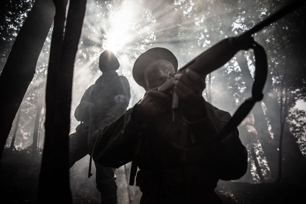 French Maquisard resistance fighters use a height of land to defend against a German attack. (Dramatic Recreation) (Gavin Marck)