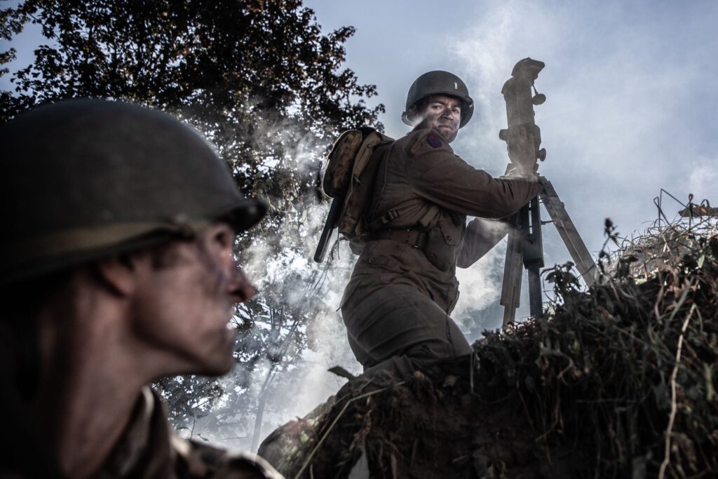 American Captain Robert Moore prepares to advance against a German barricade in the Hurtgen Forest. (Dramatic Recreation) (Dylan Araki)