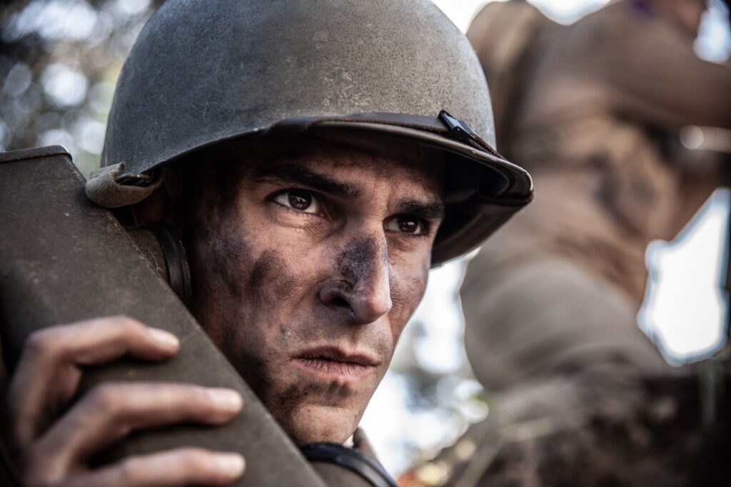 U.S. Sergeant Ammon Sasser radios for an artillery strike on an advancing German column. (Dramatic Recreation) (Kevin Trumble)