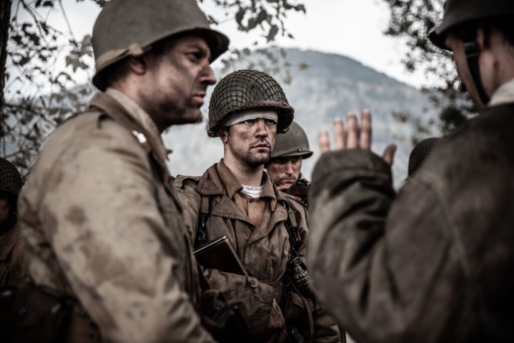 U.S. troops ambush a German patrol. (Dramatic Recreation) (L-R: Gavin Marck, Kaden Connors, Kevin Trumble)