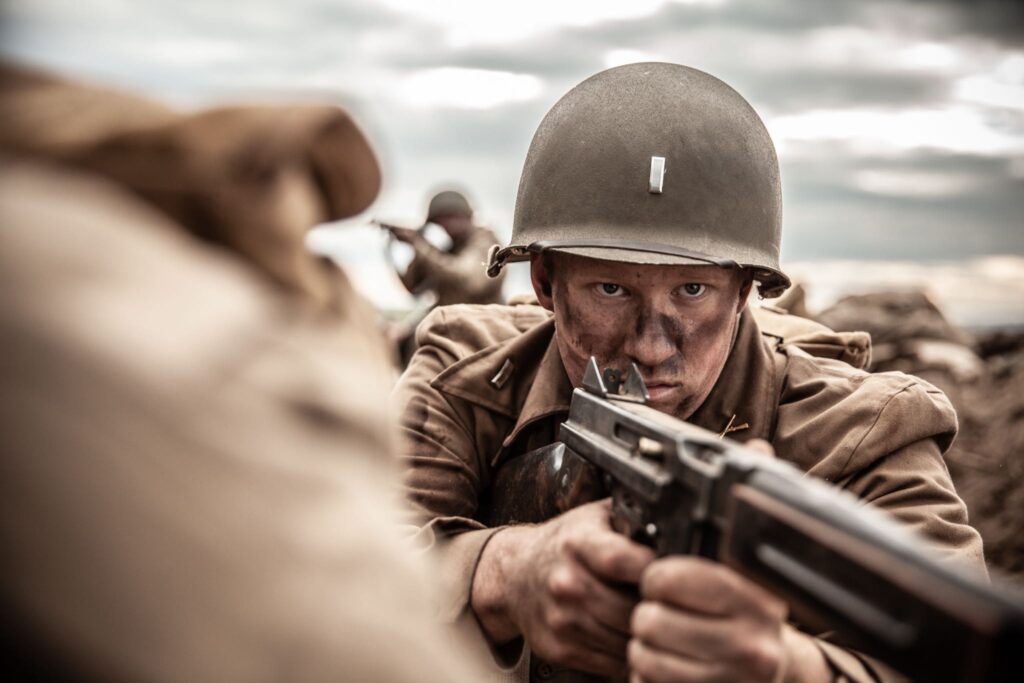 Lieutenant Rex Ross advances up a trench in Fort Koenigsmacker. (Dranatic Recreation) (Kyler Fagan)