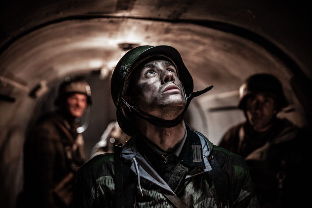 German soldier hears a sound from the roof of Fort Koenigsmacker. (Dramatic Recreation) (Marcel Faucheret)