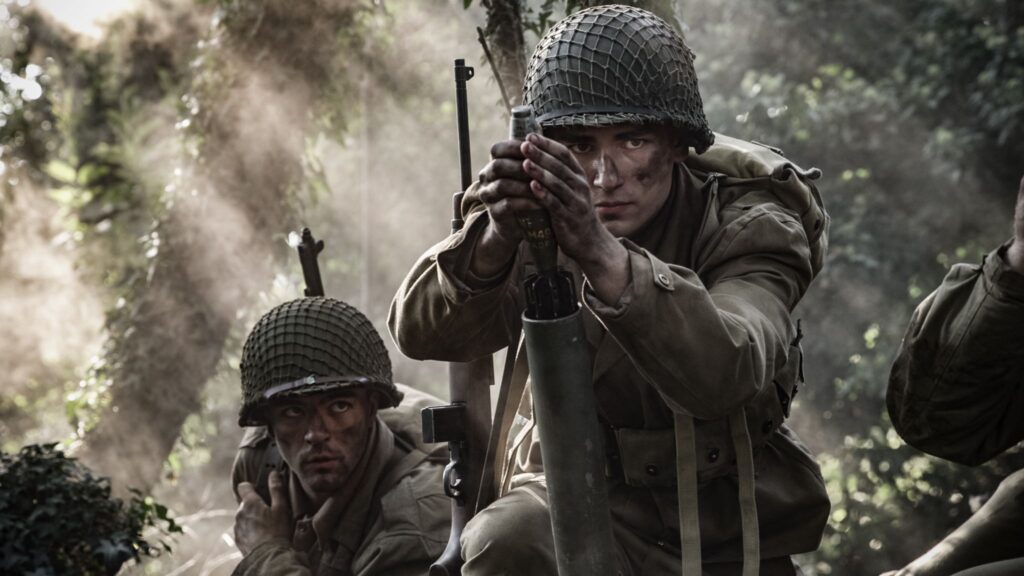 US Soldiers fire mortars against the Germans positions. (Dramatic Recreation) (L-R: Lincoln Tisdale, Zachary Sieber)