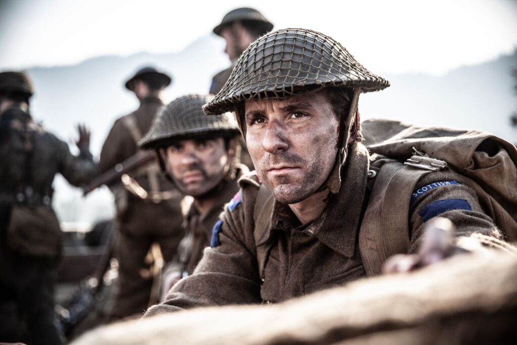 Canadian Acting Major Frederick Tilston and Lt. Charles Gatton prepare to attack the next German trench in the Hochwald Forest. (Dramatic Recreation) (L-R: Amir Zeino, Curtis Lovell)