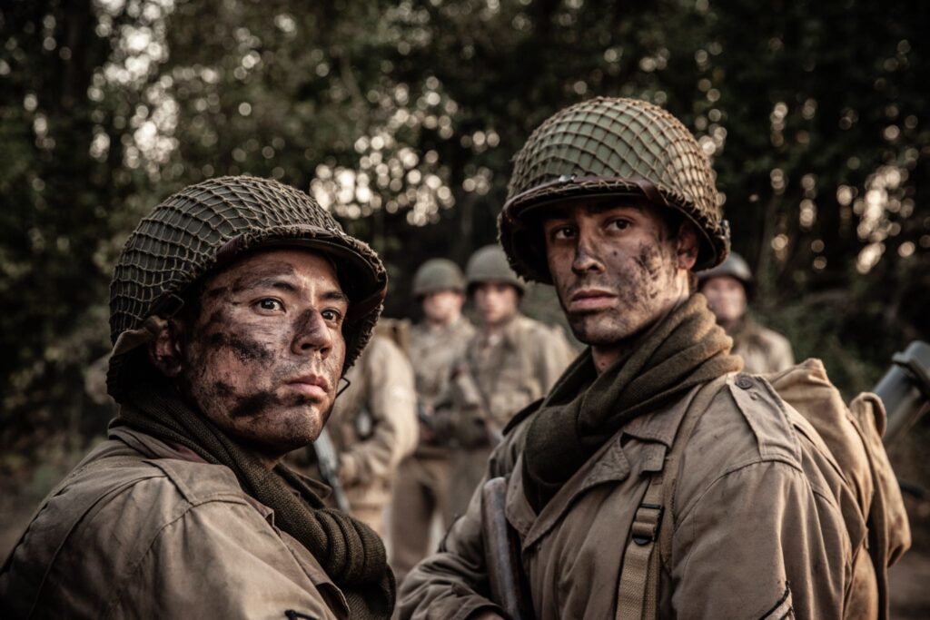 Private First Class Francisco Delgado and Private Pedro Cano emerge from the Battle of the Hurtgen Forest. (Dramatic Recreation) (L-R: Harry Tamacas Perla, Marcel Faucheret)