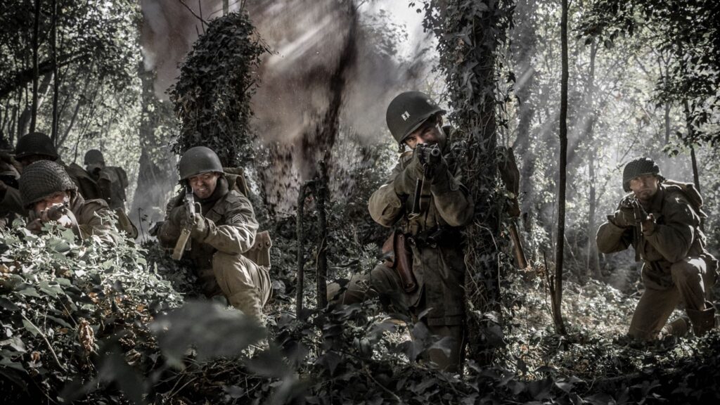 American Captain Robert Moore and C Company are ambushed by Germans inside the Hurtgen Forest. (Dramatic Recreation) (L-R: Juan Jose Cadotte, William Grossman, Dylan Araki & Zac Parlette)