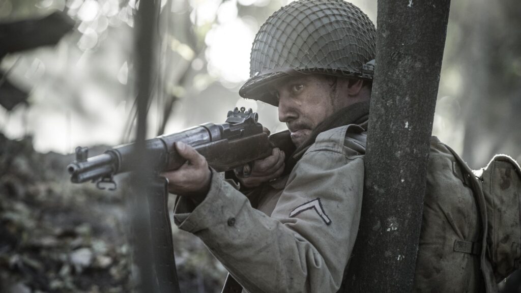 American Private Pedro Cano caustiously advances in the Hurtgen Forest. (Dramatic Recreation) (Marcel Faucheret)