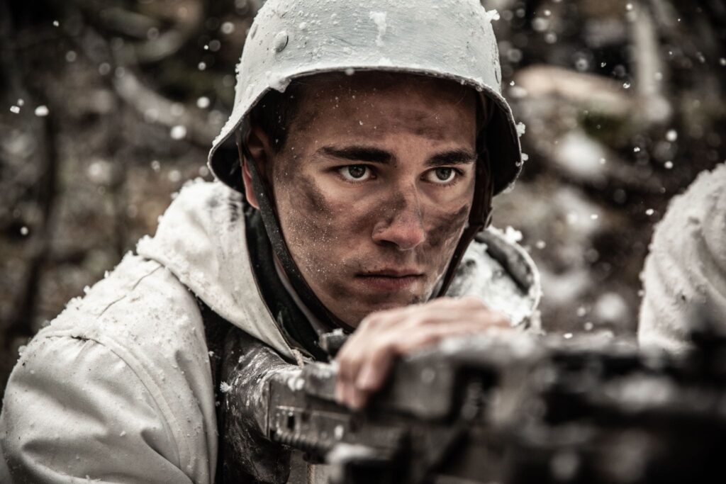 A German machine gunner fires into B Company of the US 15th Infantry Regiment. (Dramatic Recreation) (Kevin Trumble)