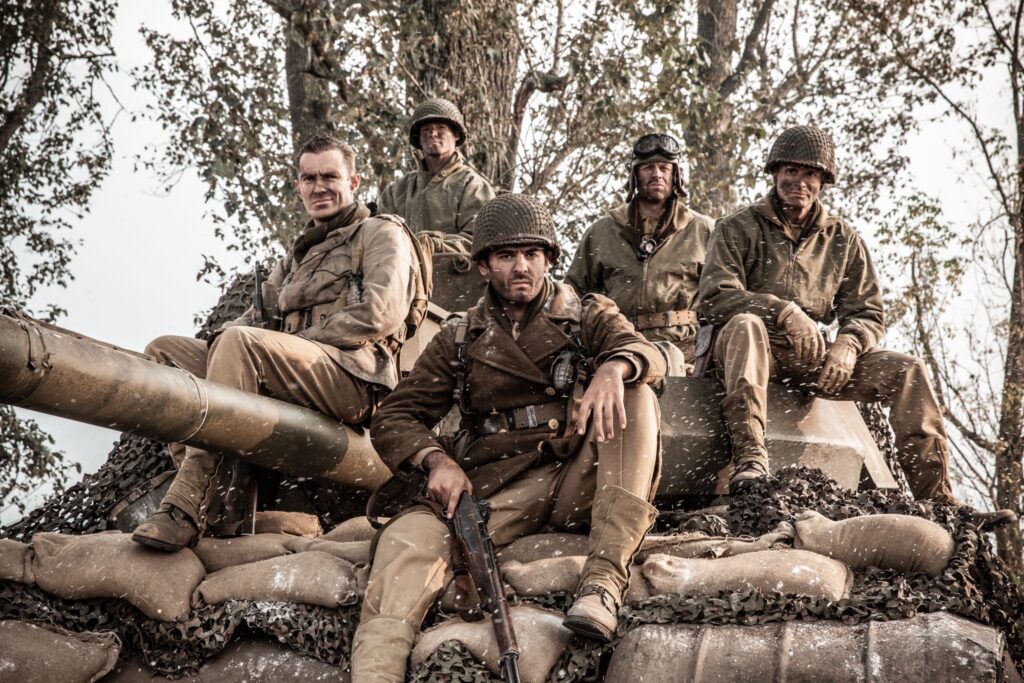 2nd Lieutenant Audie Murphy and the 15th Infantry Regiment msut hold the road through the Riedwihr Woods until reinforcements arrive. (Dramatic Recreation) (L-R: William Redfern, William Grossman, Amir Zeino, Gavin Marck, Alessandro Pekin)