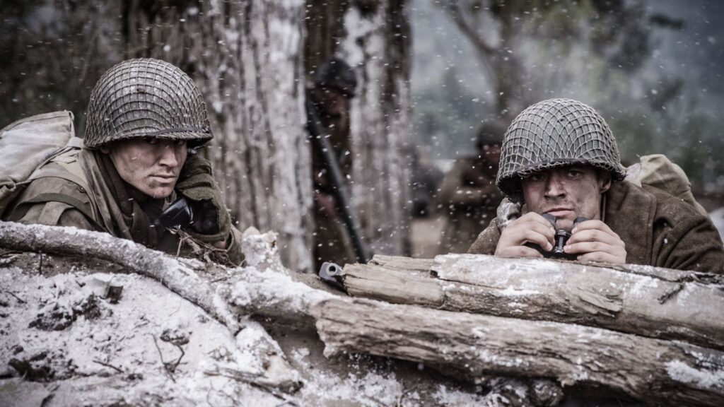 B Company watches German tanks and soldiers advancing across the field from the village of Holtzwihr. (Dramatic Recreation) (Havoc Turchyniak, Nathan Plumite)